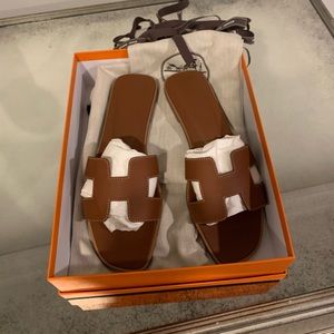 Hermes Oran in gold